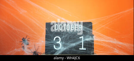 The concept for Halloween. wooden calendar showing October 31 Stock Photo