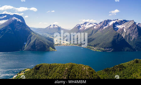 Aerial view on Geiranger town, harbor and fjord in More og Romsdal county in Norway famous for his beautiful boattrip through the fjord. Stock Photo