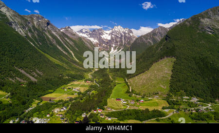 Aerial view on Geiranger town, harbor and fjord in More og Romsdal county in Norway famous for his beautiful boattrip through the fjord. Stock Photo