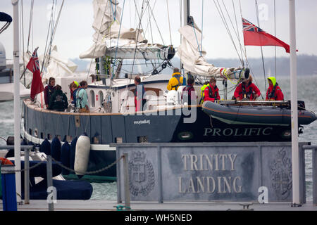 Ocean,Youth,Trust,training,yacht,boat,boating,Prolific,crew,young,people,students,teachers,wet,weather,gear,oil,skins,offshore,Cowes,Isle of Wight,UK, Stock Photo