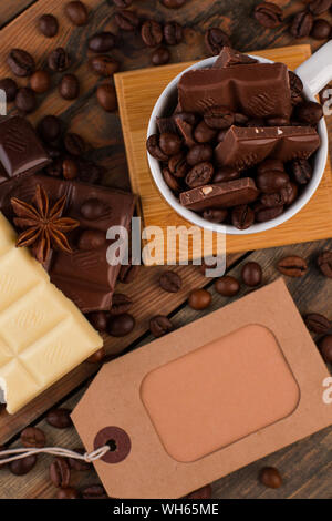 Chocolate, coffee beans and price tag. Stock Photo