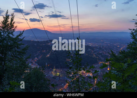 Night view over Brasov, under the last lights of the sunset Stock Photo
