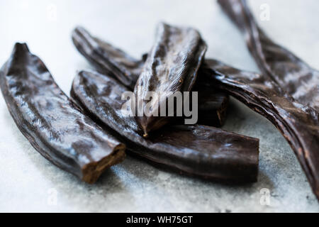 Carob Pods / Ceratonia Siliqua  Ready to Eat. Organic Food. Stock Photo