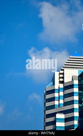 Blue and White building with blue sky background Stock Photo