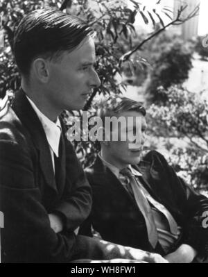 W H Auden and Christopher Isherwood in Central Park, New York, summer, 1938. Wystan Hugh Auden (1907-1973) was an English poet and critic, widely regarded as among the most influential and important writers of the 20th century. He spent the first part of his life in the United Kingdom, but emigrated to the United States in 1939, becoming a U.S. citizen in 1946. W H Auden, The Life of a Poet, by Charles Osborne.. . Stock Photo