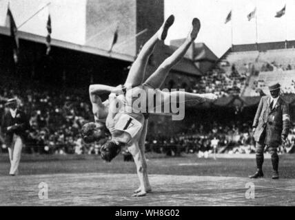 Stockholm 1912 Olympic Games. A demonstration of glima wrestling. Glima wrestling is still practiced in Scandinavia today and it is believed that it is almost unchanged from the Viking era. The Olympic Games page 75. Stock Photo
