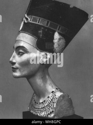 Bust of Queen Nefertiti. Nefertiti was the wife of the Egyptian Pharaoh Amenhotep IV (later Akhenaten), and mother-in-law of the Pharaoh Tutankhamen. Her name roughly translates to the beautiful one is come. The bust is one of the most copied works of ancient Egypt. It was attributed to the sculptor Djhutmose, and was found in his workshop. The Treasures of Tutankhamen. Tutankhamen by Christiane Desroches Noblecourt, page 105.. Stock Photo