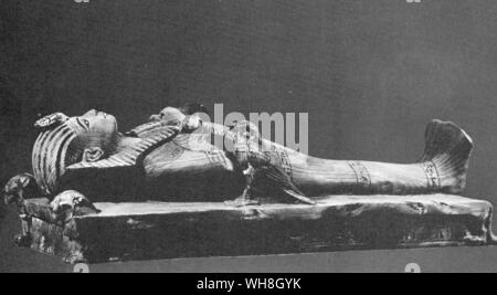 Miniature Effigy of the King lying on a bier. The Treasures of Tutankhamen, The Exhibition Catalogue by  I E S Edwards, page 80. Stock Photo