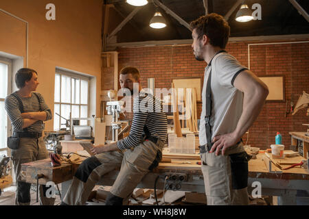Team of carpenters in the workshop Stock Photo