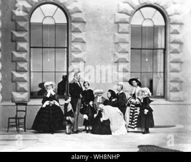 Royal Group at Osbourne 1857 left to right Princess Alice, Prince Arthur, Prince Albert, Prince of Wales, Prince Leopold, Princess Louise, Queen Victoria with Princess Beatrice , Prince Alfred, Princess Royal and Princess Helena Stock Photo