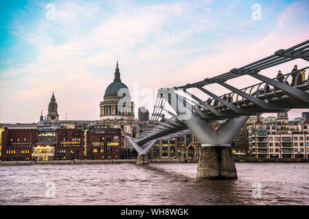 St. Pauls Cathedral at sunset, Millennium Bridge and River Thames, The City of London, London, England, United Kingdom, Europe
