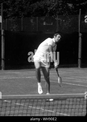 Australian player, John Newcombe, showing a full shoulder action.. Stock Photo