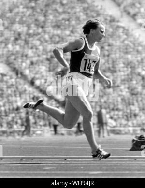 September 1972: Munich Olympics: Renate Stecher of Germany runs the women's 100m. Stock Photo