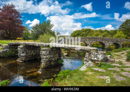 Medieval clapper bridge over the East Dart River at Postbridge on Dartmoor in Devon, England, United Kingdom, Europe