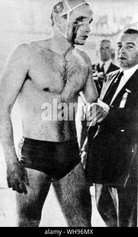 Aus., Melbourne, Olympics, 1956: Ervin Zador of the Hungarian water polo team leaves the water after his clash with USSR.. Stock Photo