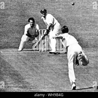 Sir Don G Bradman batting against Essex at Southend in 1948. Peter Smith is the bowler  F Rist is keeping wicket Stock Photo