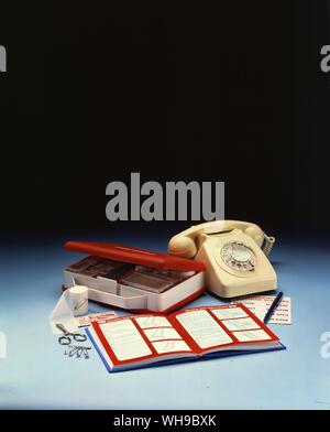 'Emergency' : Telephone, first aid box and instructions. Stock Photo