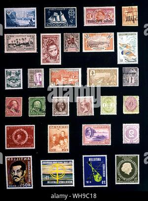 A number of stamps from all over the world in an album on a black background. Stock Photo