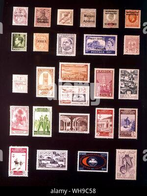 AFRICA - MOROCCO: (left to right)1. French Post Offices, 2 centimos, 1902, 2. German Post Offices, 60 centimos, 1900, 3. Sanish Post offices, 0.25 centimo, 1903, 4. Gibraltarian Post Offices, 20 centimos, 1898, 5. British Post offices, 20 centimos, 1907, 6. British Post Offices, 2 pence, 1936, 7. British Post offices, 5 centimes, 1937, 8. Tangier (French Post Office), 3 centimes, 1917, 9. Tangier (Spanish Post office), 10 centimos, 1948, 10. Tangier (British Post Office), 10 shillings, 1957, 11. Morocco (Cherifian Post), 2 moussonats, 1912, 12. French Zone, 1 centime, 1914, 13. French Zone, 3 Stock Photo