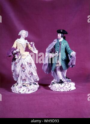Continental Figurine Tailor and Seamstress Stock Photo
