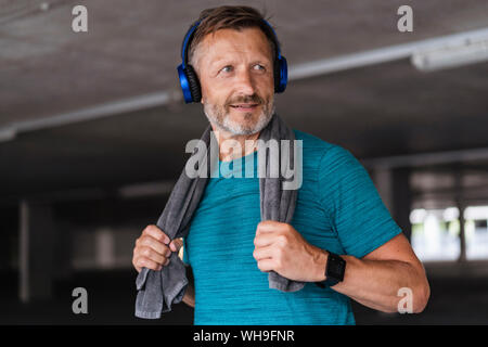 Sporty man wearing headphones after workout Stock Photo