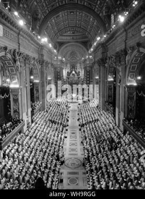 29th September 1969: Rome, Italy: General overhead view along the central nave of St Peter's Basilica during the opening ceremony of the second session of the Roman Catholic Ecumeical Council. Pope Paul VI sits on his throne in front of the Papal Altar (Altar of the Confession) under Bernini's famed bronze canopy in the far background, and the Council Fathers are sitting in their stands left and right along the aisle. Stock Photo