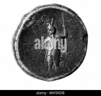 A coin commemorating Alexander's expedition to the Punjab and his defet of Porus. Alexander's helmet is modelled on the Persian royal head-dress, the peaked kyrbasia, with added plume Stock Photo