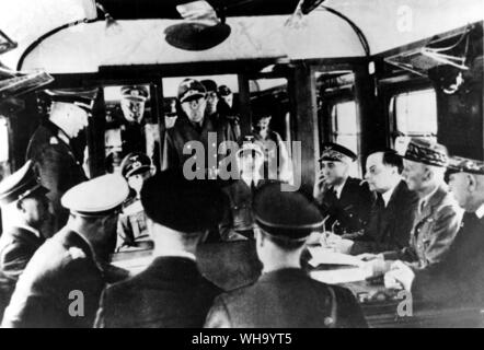 WW2: Signing of the French surrender, 1940. Hitler (on the left) with Hess (centre  right). Stock Photo