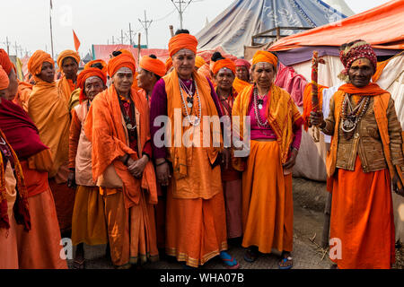 Sadhvi in orange red saree during Allahabad Kumbh Mela, World's largest religious gathering, Allahabad, Uttar Pradesh, India, Asia Stock Photo