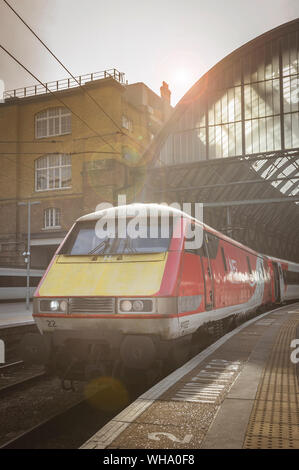 Class 91 locomotive in LNER livery waiting at Kings Cross Railway Station, London, England. Stock Photo