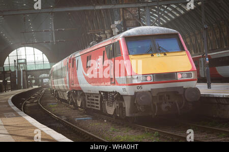 Class 91 locomotive in LNER livery waiting at Kings Cross Railway Station, London, England. Stock Photo