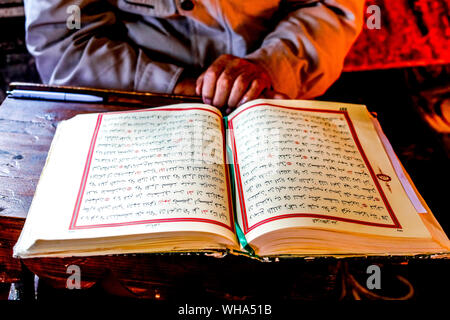 Macedonian Muslim reading the Koran, Pasha Mosque, the painted mosque of Tetovo, Republic of Macedonia, Europe Stock Photo
