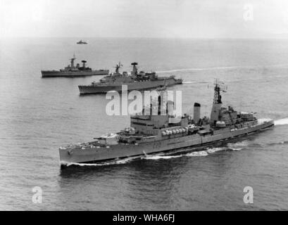 Royal Navy goodwill visit to 8 South American Countries, Venezuela Columbia Equador Peru Chile Argentina Uraguay and Brazil. In foreground is the cruiser Tiger, centre is the County Class guided missile destroyer London, in rear HMS Penelope Leader Class Frigate. November 1964 Stock Photo