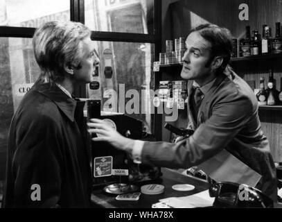 Monty Python's Flying Circus. Eric Idle & John Cleese in a hilarious sequence . 17th April 1972 Stock Photo