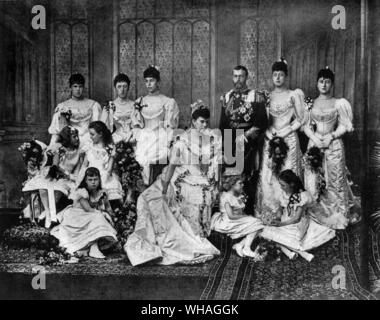 The Duke of York and his bride with the bridesmaids. Back row, left to right, Princess Alexander of Edinburgh, Princess Victoria of Schleswig-Holstein, Princess Victoria of Edinburgh, The Duke of York, Princess Victoria of Wales, Princess Maud of Wales. Middle row, Princess Alice of Battenberg, Princess Margaret of Connaught, The Duchess of york, . Front Row Princess Beatrice of Edinburgh, Princess Victoria of Battenberg, Princess Victoria Patricia of Connaught. Taken in Buckingham Palace on July 6th 1893. Future King George V and Queen Mary Stock Photo