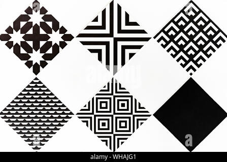 Ceramic tiles with black and white ornaments. Background and texture of ceramic tiles. Stock Photo