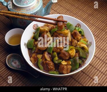 International Cooking . Sweet And Sour Pork.. Tim Suen Goo Lo Yuk, Hong Kong. Stock Photo