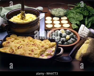Italian Cooking . . Left.. Gnocchi Di Semolina.. Semolina Dumplings.. . Right.. Gnocchi Di Spinaci E Ricotta.. Spinach And Cheese Gnocchi. Stock Photo