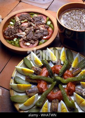 Italian Cooking By Robin Howe. . Top.. Peperoni Alla Bagna Cauda.. Sweet Peppers With Bagna Cauda Sauce.. . Bottom.. Sardine Sott'Olio.. Sardines In Tomato Sauce. Stock Photo