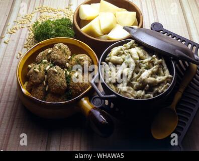 Italian Cooking By Robin Howe. . Left.. Polpette Al Forno.. Baked Meat Croquettes.. . Right.. Rane In Guazzetto.. Frogs' Legs Stew. Stock Photo
