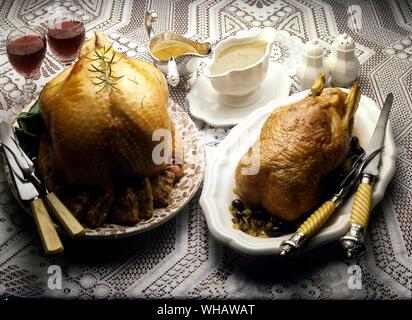 Italian Cooking By Robin Howe. . Left.. Tacchino Ripieno Arrosto.. Stuffed Roast Turkey. . Right.. Anitra All'Olivo.. Duck With Olives. Stock Photo