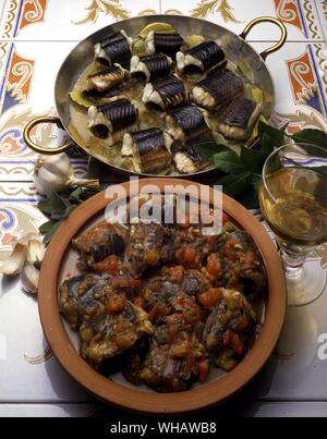Italian Cooking By Robin Howe. . Top, . Bisato Sull'ara.. Baked Eel.. . Bottom.. Bisato In Tecia.. Stewed Eels. Stock Photo