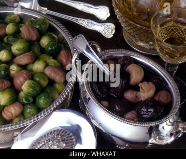 Brussels Sprouts with Chestnuts. Hot Spiced chestnuts with prunes Stock Photo