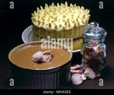 Sugarfrosted Rose Petals . Tipsy Cake and Chocolate Mousse Stock Photo