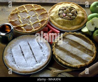 treacle tart. rhubarb plate pie. mince tart. apple plate pie Stock Photo