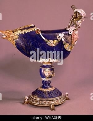 Cup in lapis lazuli surmounted by Neptune in silver garlands of ceramic and enamelled flowers. Sphinxs at base and exotic animals, from Louis XIV collection of jewels. The Sun King by Nancy Mitford, page 153. Stock Photo