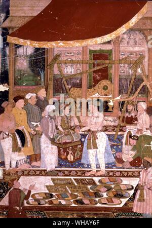 Emperor Tahangir weighing his son Prince Kurram, (the future Shah Jehan), in gold on his birthday, 1615. The Oriental Adventure by Timothy Severin, page 87. Stock Photo