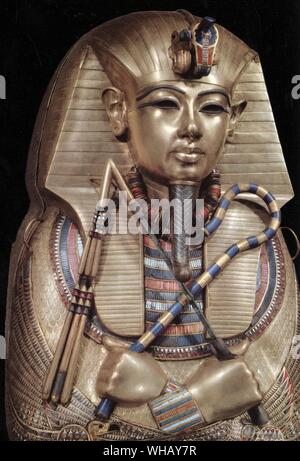 Detail of the second mummiform coffin. Gold plated wood inlaid with glass-paste. Tukankhamen, by Christiane Desroches Noblecourt, page 268.. The Egyptologist Howard Carter (employed by Lord Carnarvon) discovered Tutankhamun's tomb (since designated KV62) in The Valley of The Kings on November 4, 1922 near the entrance to the tomb of Ramses VI. Carter contacted his patron, and on November 26 of that year both men became the first people to enter Tutankhamun's tomb in over 3000 years. After many weeks of careful excavation, on February 16, 1923 Carter opened the inner chamber and first saw the Stock Photo
