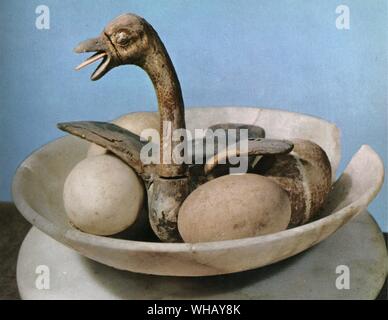 The lid of the alabaster jar, decorated with a small bowl showing a bird in its nest having just emerged from its egg.. Tukankhamen, by Christiane Desroches Noblecourt, page 227. Stock Photo