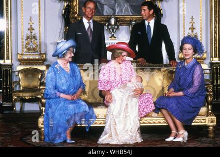 Christening of first son, William, of Prince Charles and Diana, Princess of Wales (Lady Diana Spencer) 4 August 1982 at Buckingham Palace. Diana is flanked by Queen Elizabeth the Queen Mother (grandmother to Prince Charles and mother to Queen Elizabeth II) and Queen Elizabeth II (mother of Prince Charles and mother-in-law to Diana). In the photo behind are PrincePhilip the Duke of Edinburgh, and Prince Charles, the Prince of Wales.. Stock Photo